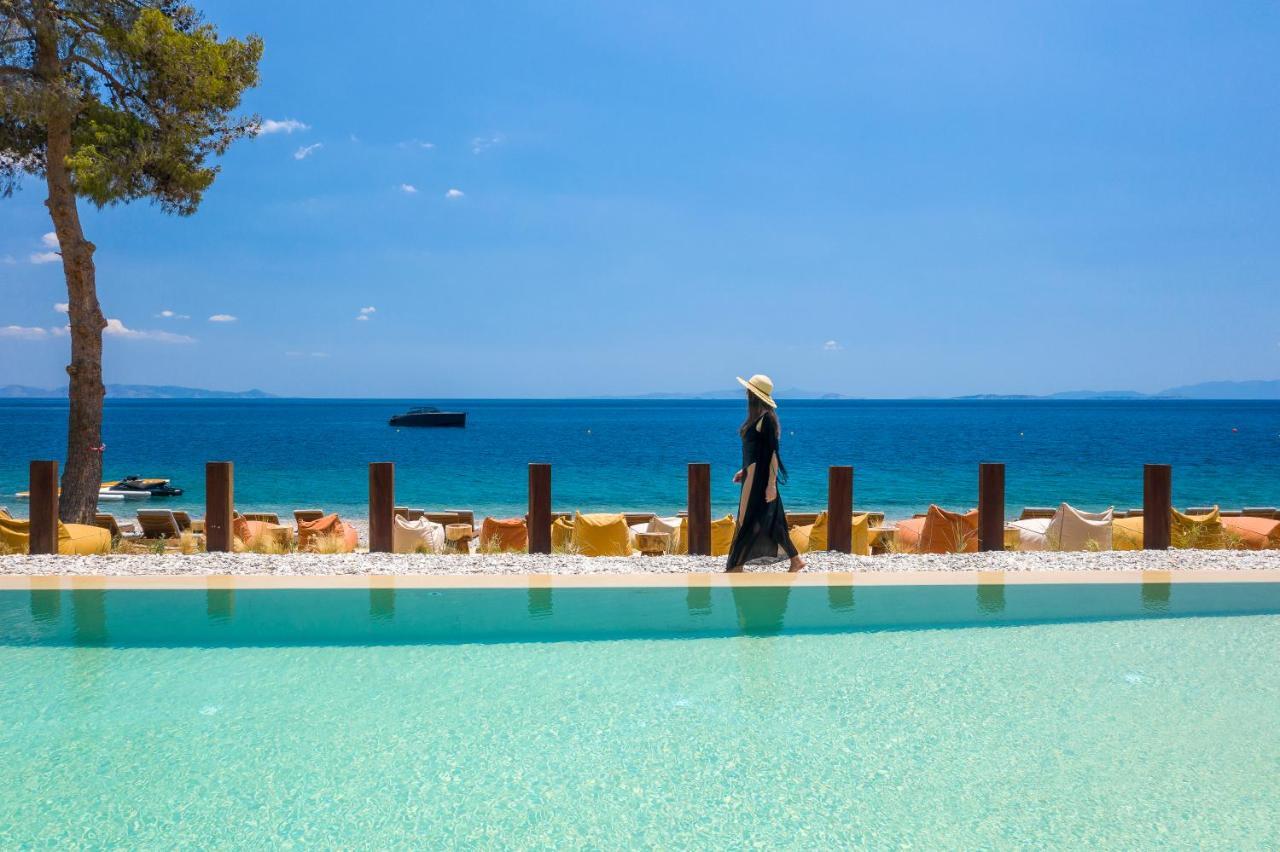 Isla Brown Corinthia Resort & Spa, Curio Collection By Hilton Agioi Theodoroi Exterior photo The beach at the hotel