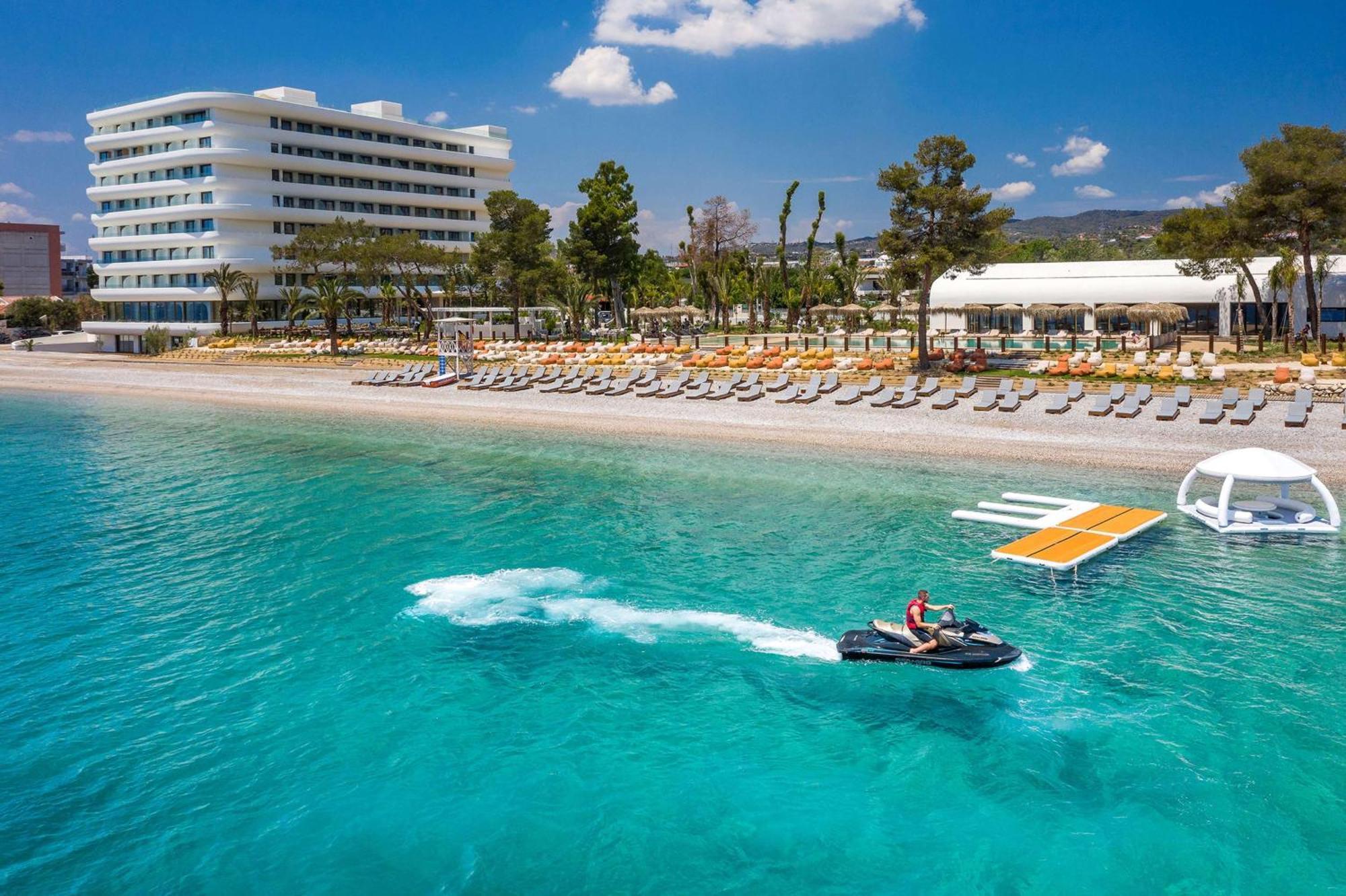 Isla Brown Corinthia Resort & Spa, Curio Collection By Hilton Agioi Theodoroi Exterior photo The resort's beach
